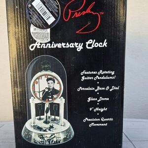 Elvis Presley Anniversary Clock with Rotating Guitar Pendulums